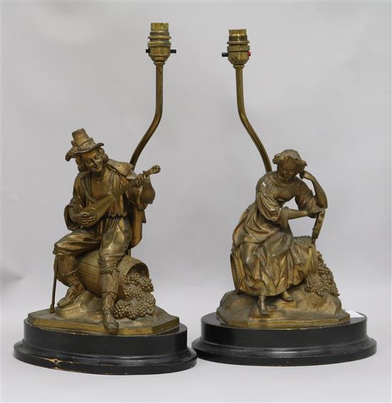 A pair of spelter figural lamp bases, height 47cm